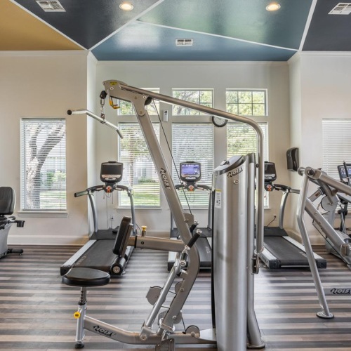 Quick access to state-of-the-art amenities a gym with exercise equipment